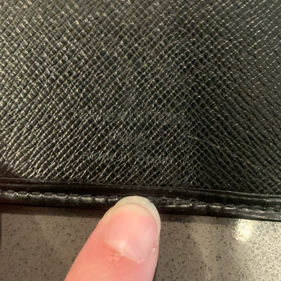 Authentic Louis Vuitton black epi long bifold wallet. Date code is CA1925 - Picture 4 of 8